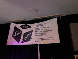 A sign saying DIY Space for London. Volunteer Run Since 2015. Speak to someone behind the bar or at the membership desk for more information diyspaceforlondon.org/volunteer